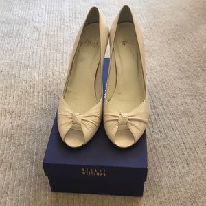 Stuart Weitzman white pumps